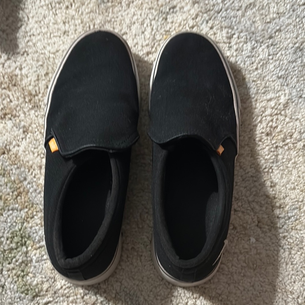 Nike Black and White Slip-On Sneakers